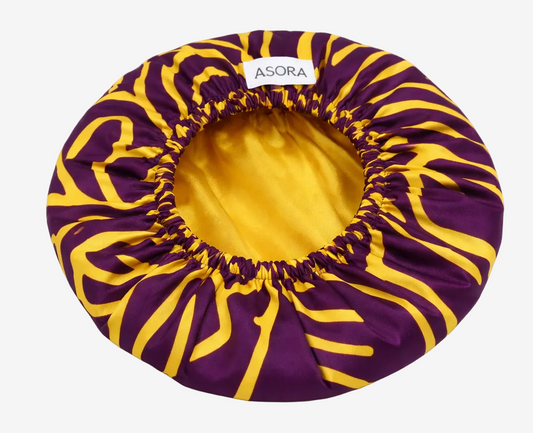 Purple and yellow striped hair bonnet with 'ASORA' branding on a white background