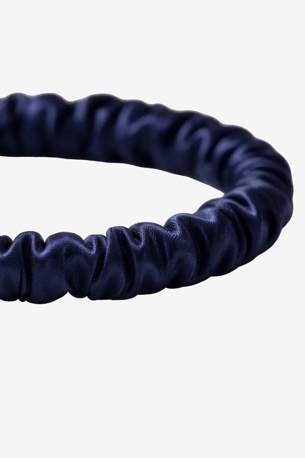 ASORA Mulberry silk skinny scrunchie, Navy blue scrunchie on a light gray background