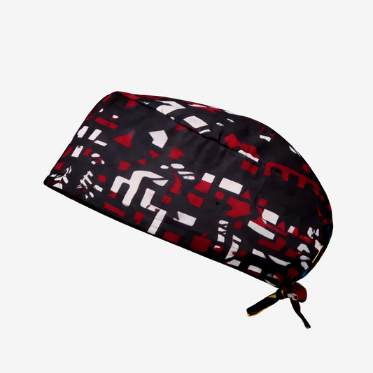ASORA, Black scrub cap with red and white geometric pattern on a light gray background