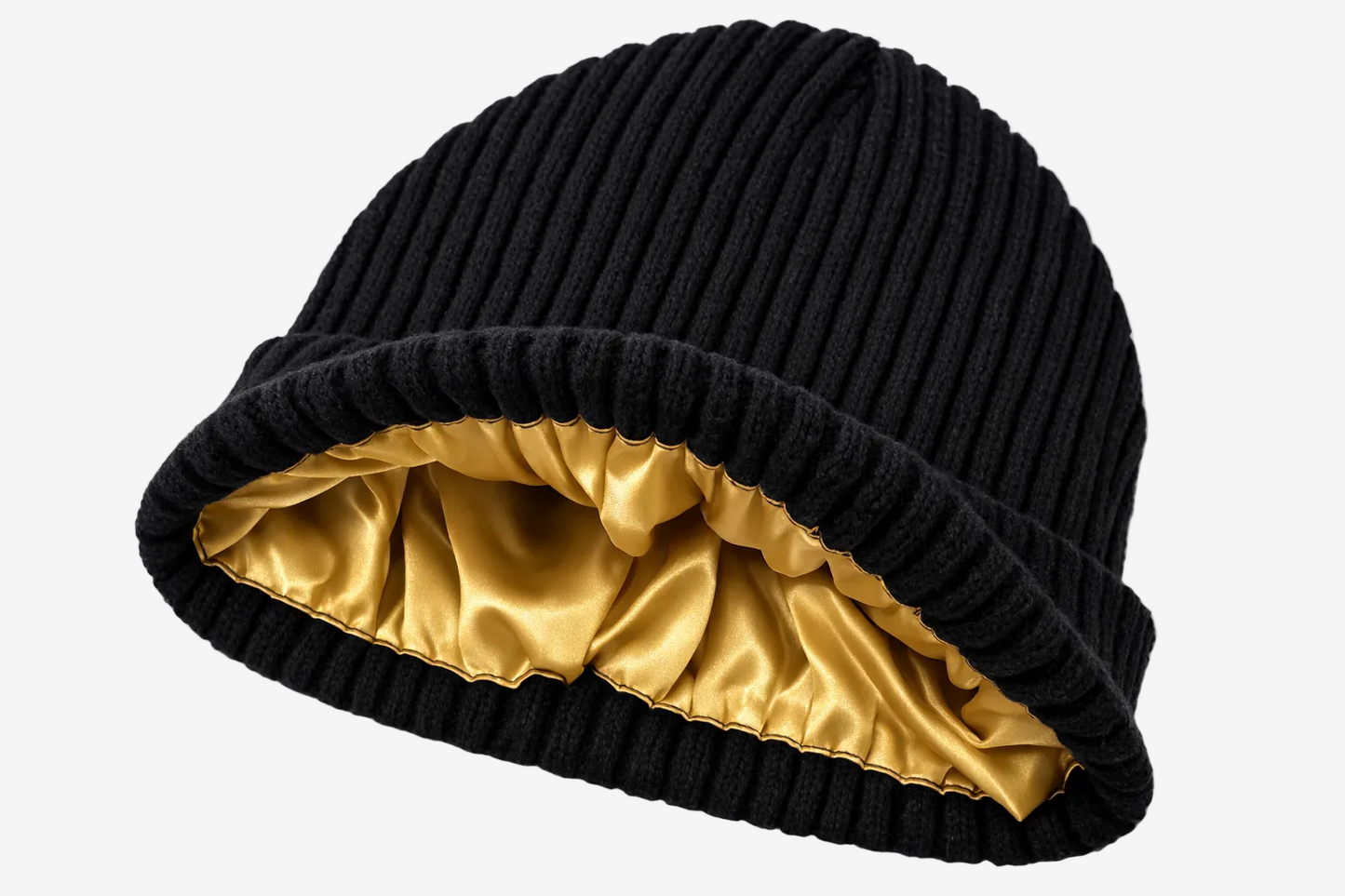 ASORA, Black knit beanie with gold interior on a white background
