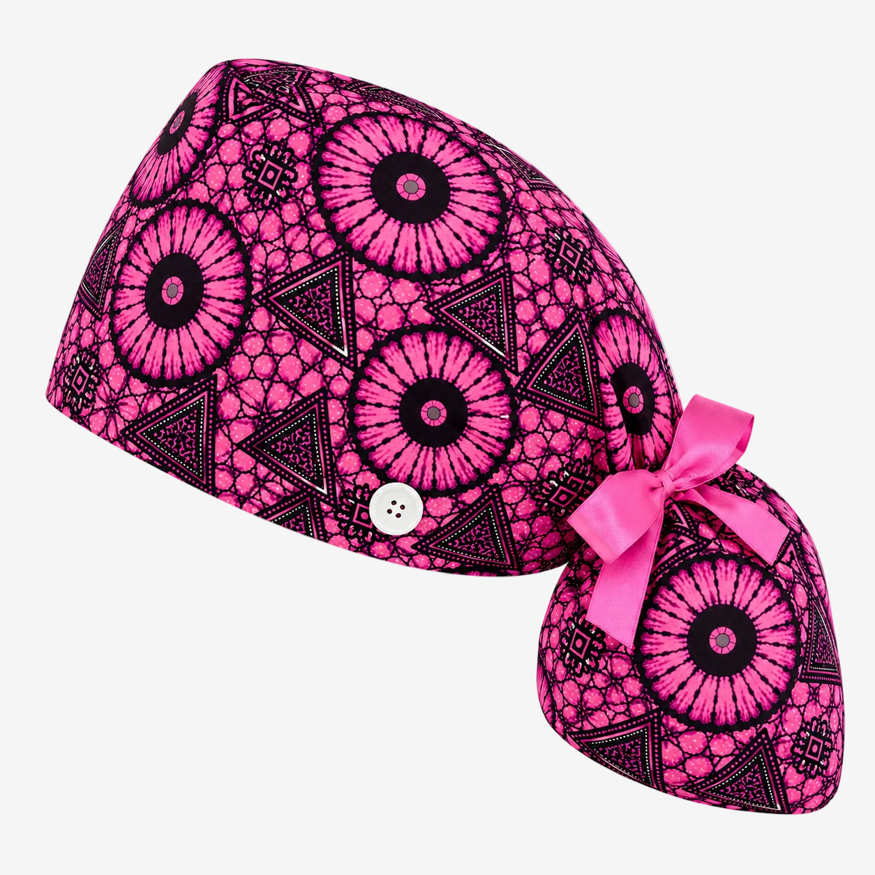 Pink and black patterned ASORA ponytail scrub cap with a pink bow on a white background